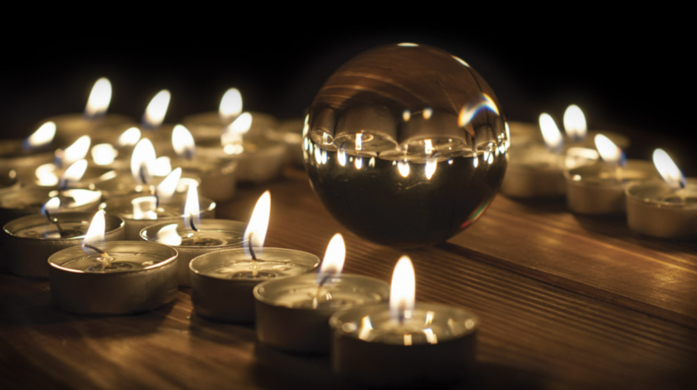 Crystal ball and candles