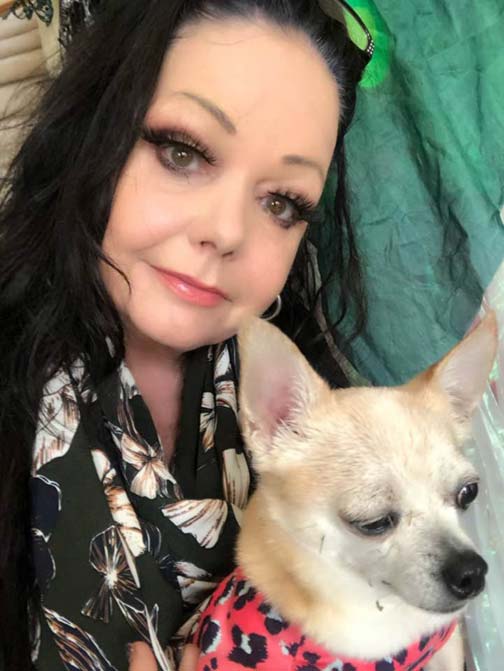 “Nicole has been dubbed ‘The Oprah Winfrey of radio" here Nicole Marie Whitney is seen with with dog Poppy (Photo: Facebook)
